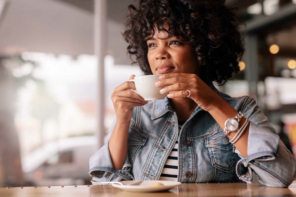 woman drinking coffee wonders if depression is curable