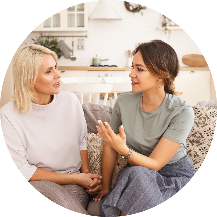 two women talking on couch at honey lake clinic