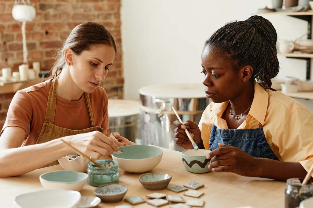 two patients engage in different types of art therapy