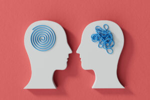 cut out faces representing mood disorders in the brain