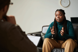 patient talks with therapist in cognitive processing therapy