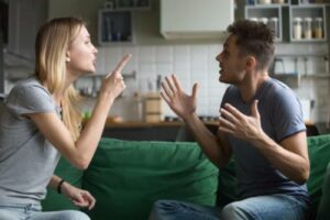 two people argue to show an anger management program 