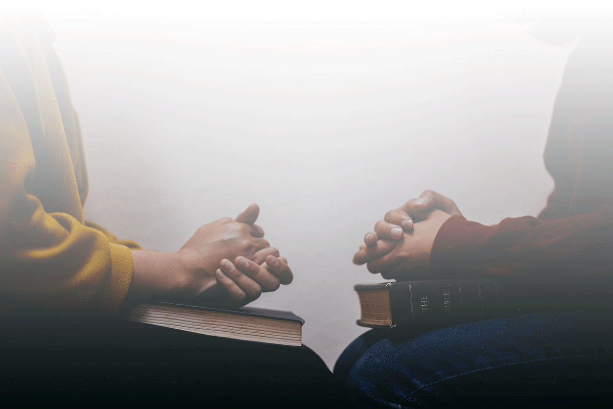 Hands of people in Christian mental health counseling