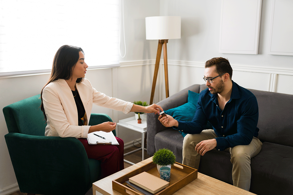 a man speaks with his psychiatrist about increasing the dosage of his antidepressant