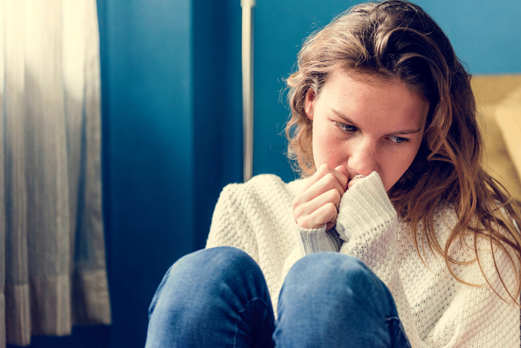 Girl thinking about the different forms of self-harm