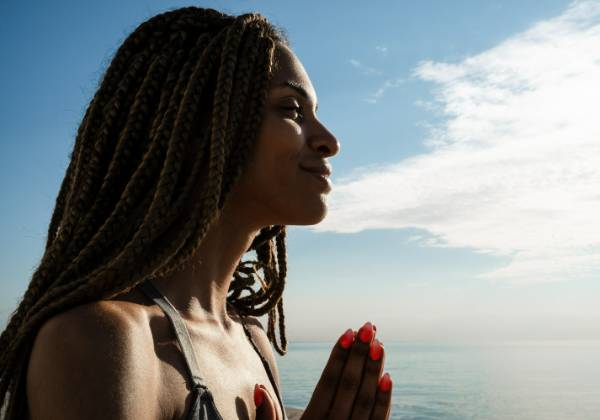 a person meditates during a meditation therapy program